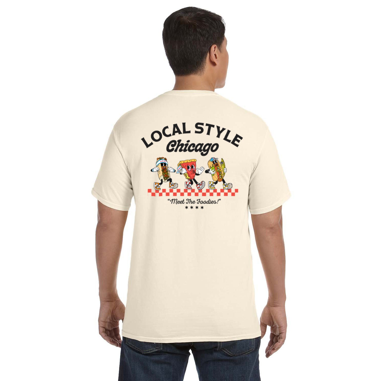 Man wearing a beige t-shirt with 'Local Style Chicago' graphic on the back