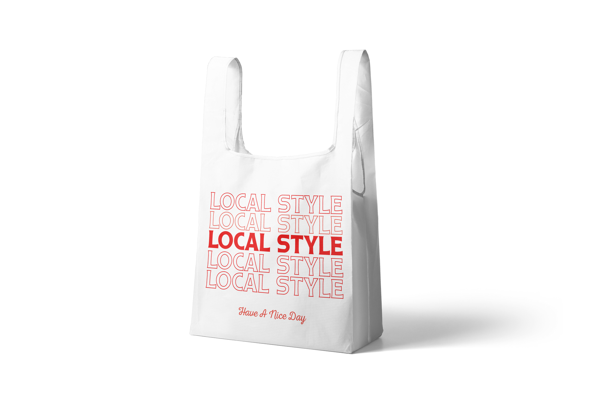 A white deli-style carryout bag with red text that reads 'LOCAL STYLE' and 'Have A Nice Day"