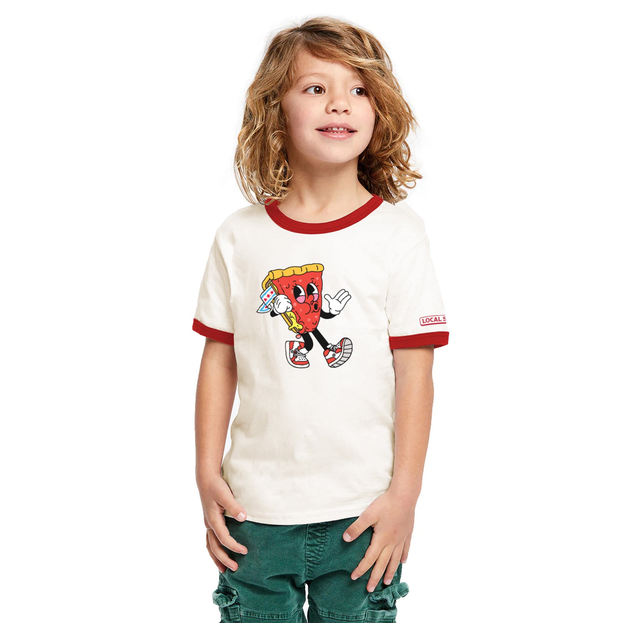 Child wearing a white t-shirt with a cartoon character design on a plain background
